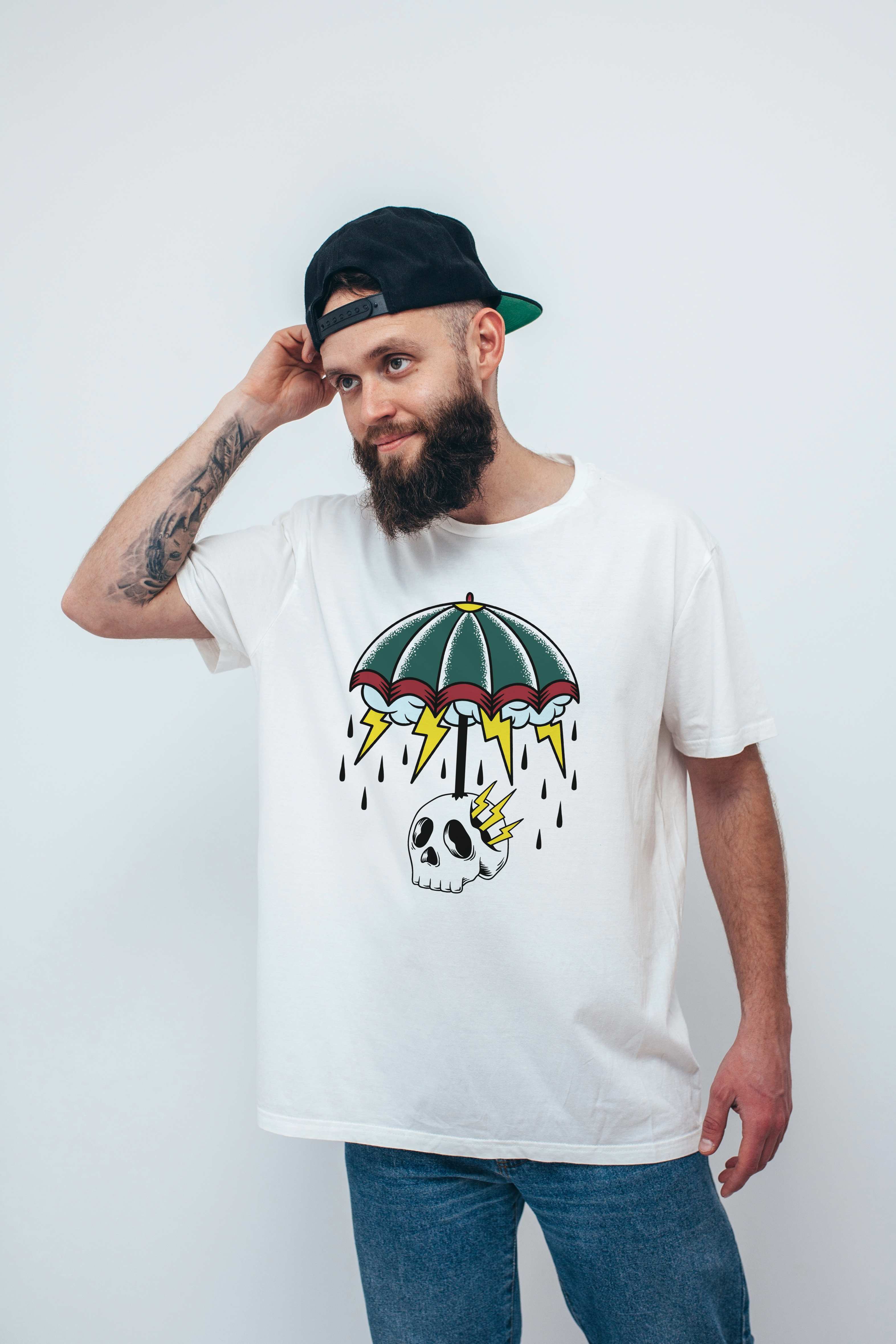 "Urban Rebellion: Skull & Storm Graphic Tee by RJMK Clothing"